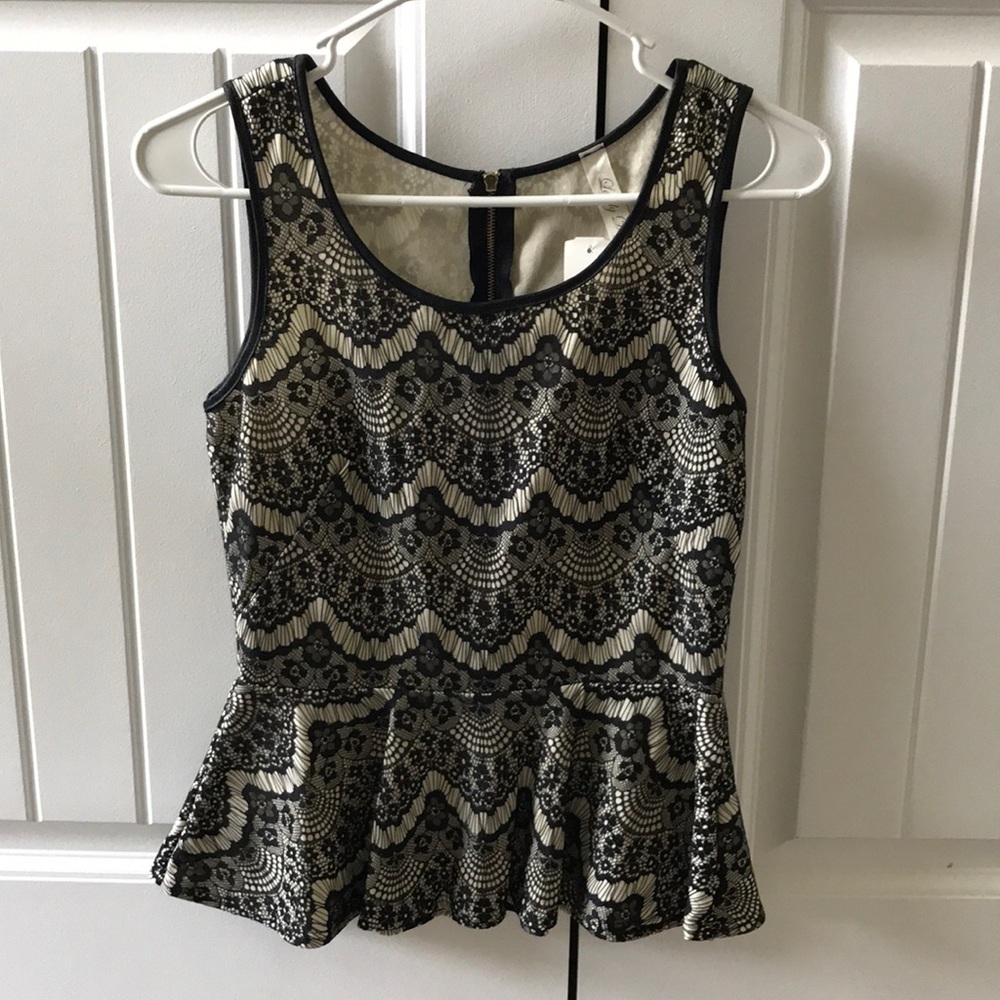 Black/ivory peplum top